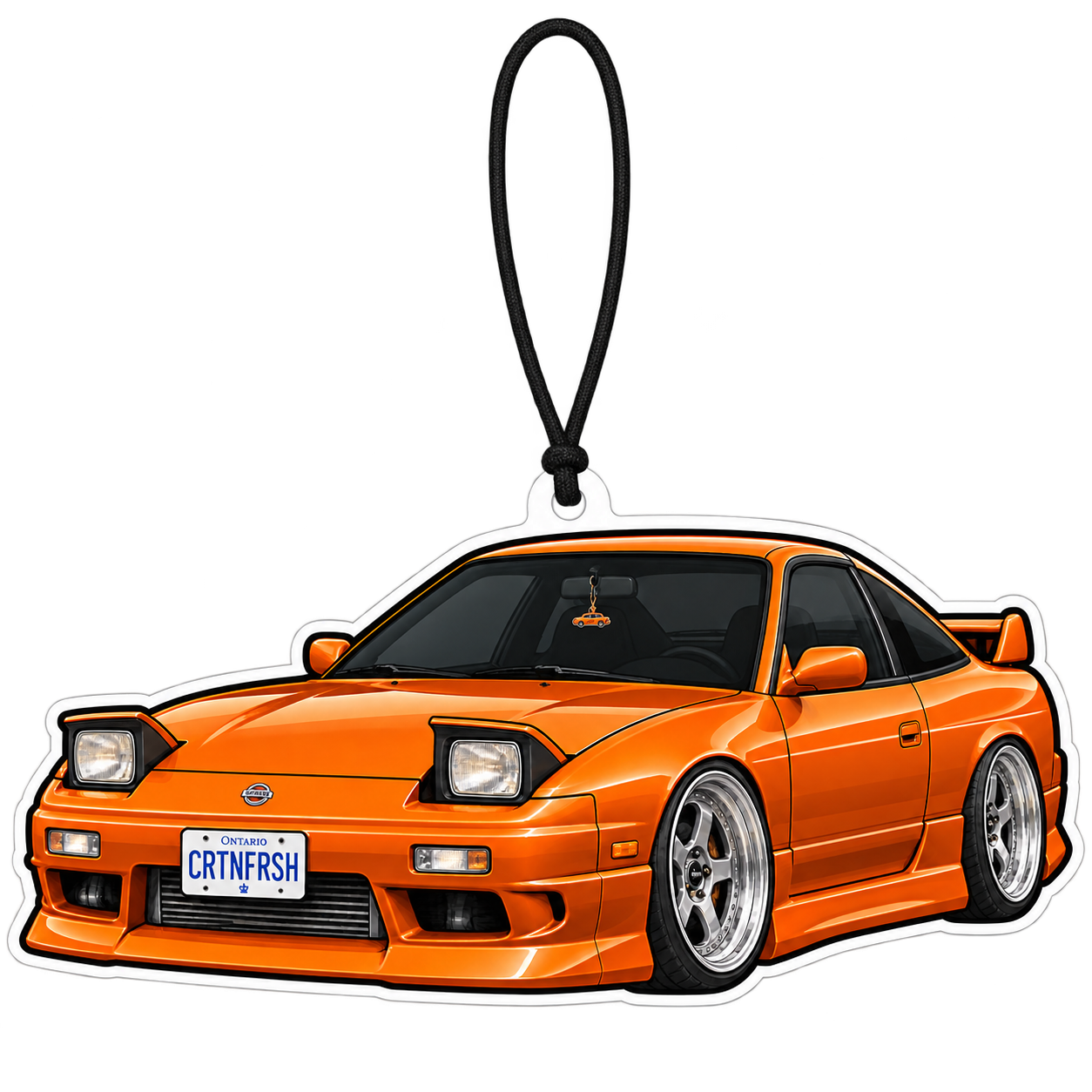 Orange sports car air freshener with a white die-cut border and a black elastic loop threaded through its hanging hole